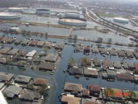 Oiled neighborhood and source tank (far, second from left)